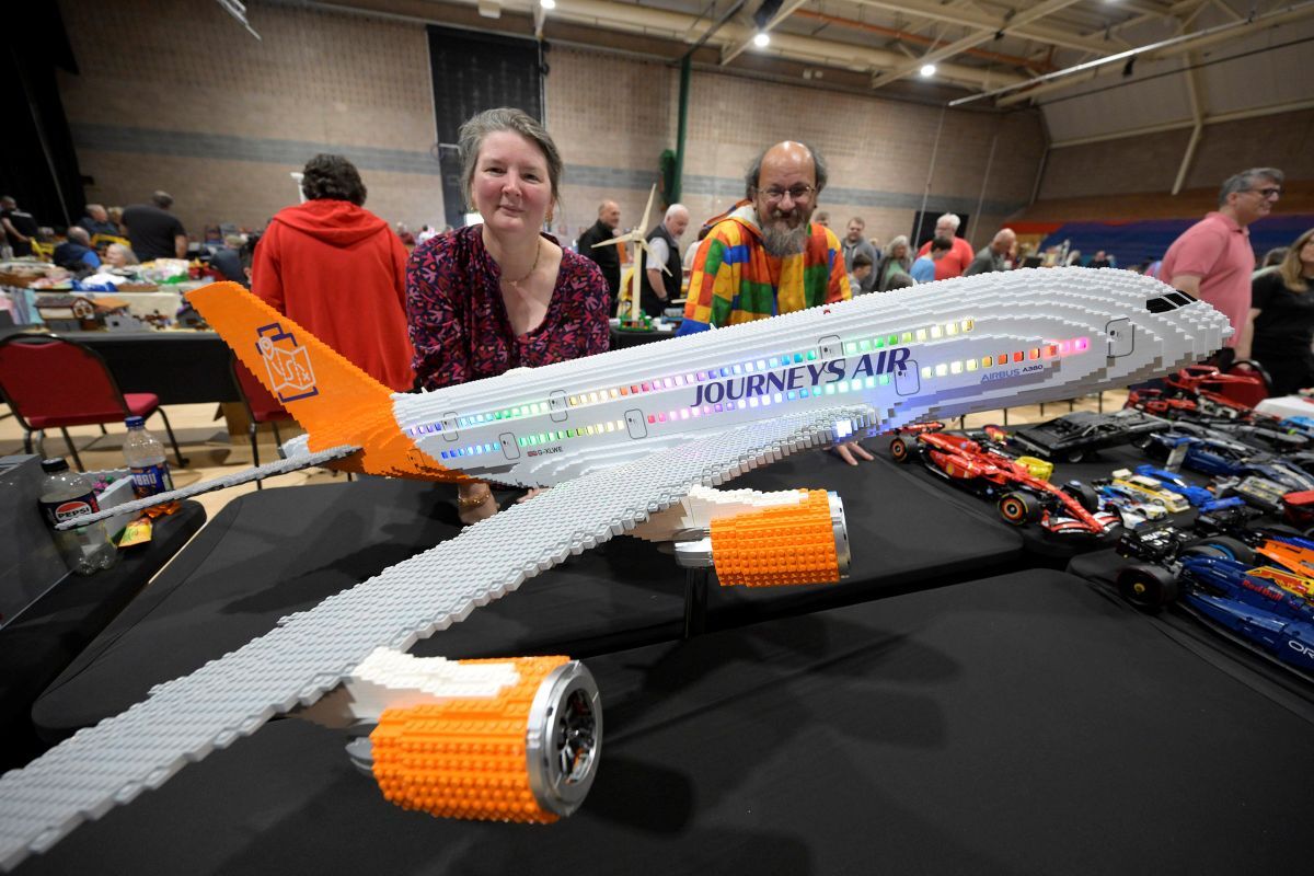 The largest Lego model in the show of the biggest commercial airliner, the Airbus A380, with Edinburgh enthusiasts Theresa and Warren Elsworth. Photograph: Iain Ferguson, alba.photos.