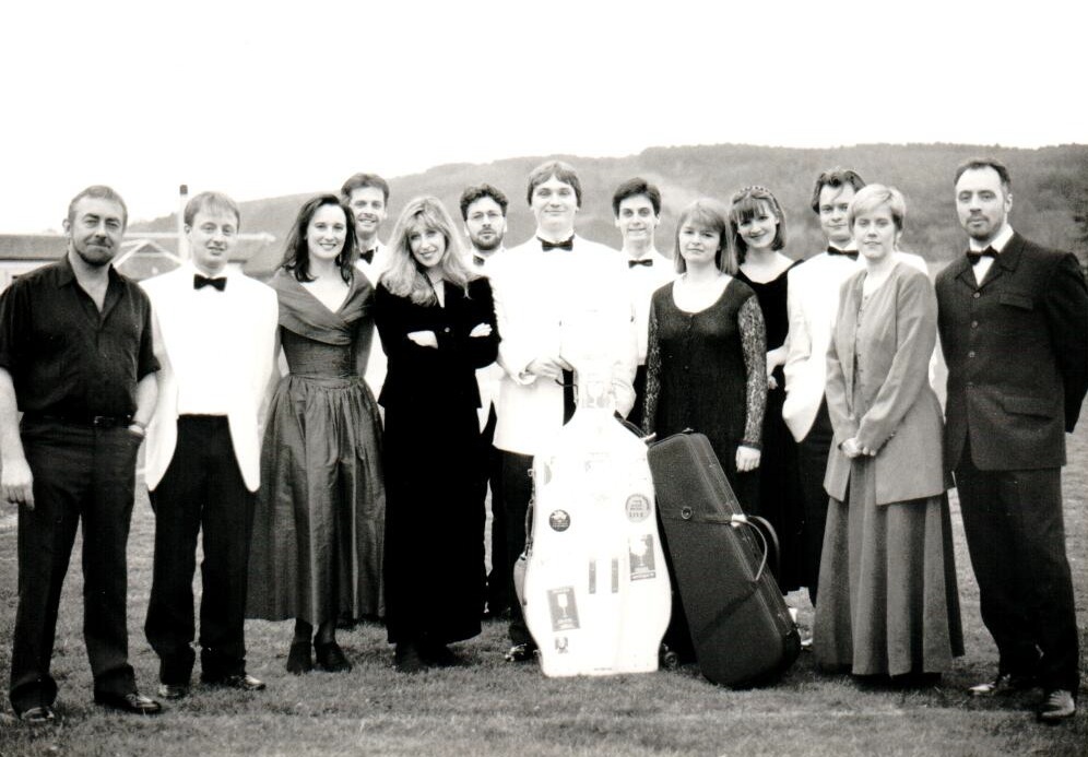 BT Scottish Ensemble that visited Arran for their second Arran Festival of Music. On the left is Aly Bain and on the right is manager, Roger Pollen.