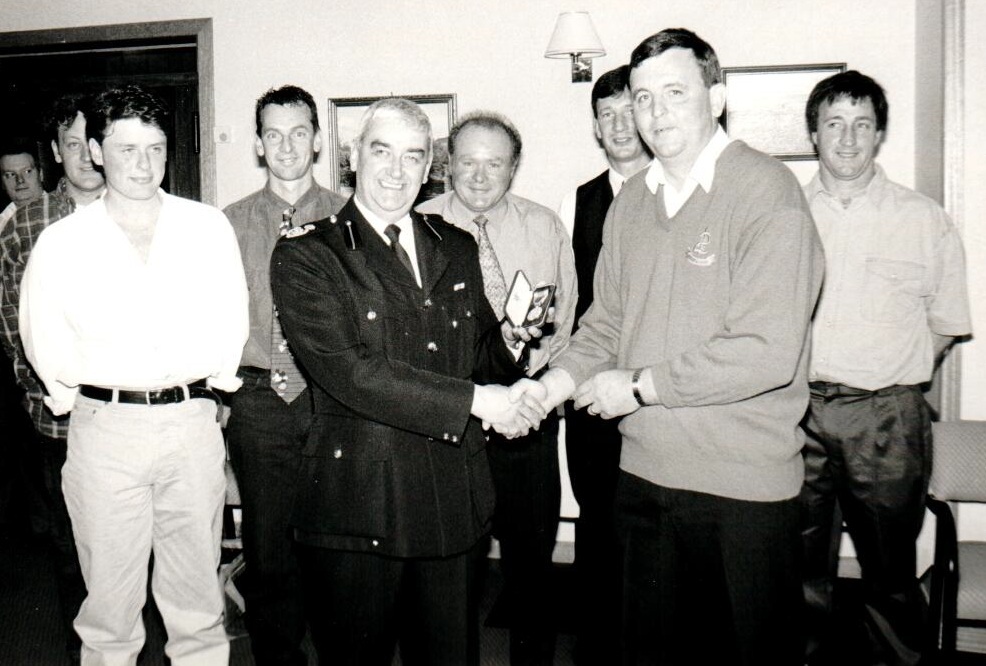 Calum Gilmore of Shiskine was awarded his 20 year Fire Service Medal by Assistant Firemaster David Kennedy. 