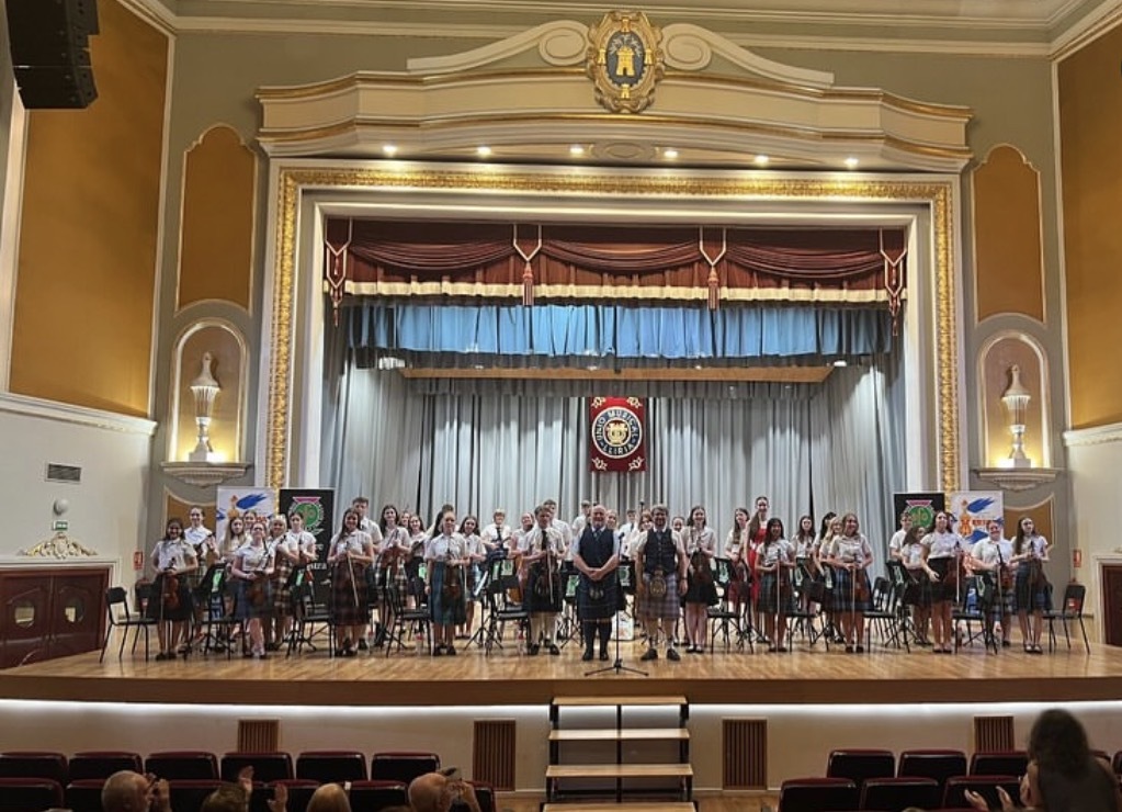 Ayrshire Fiddle Orchestra members in concert on a previous tour. Photograph: Ayrshire Fiddle Orchestra.