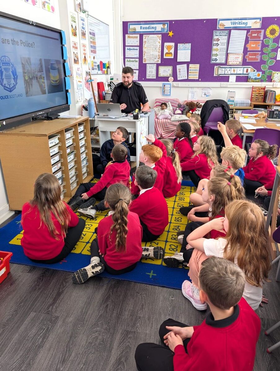 Community engagement officer PC Cameron Shaw speaks to Dalintober Primary pupils about policing and online safety during a classroom visit. Community engagement officer PC Cameron Shaw speaks to Dalintober Primary pupils about policing and online safety during a classroom visit.