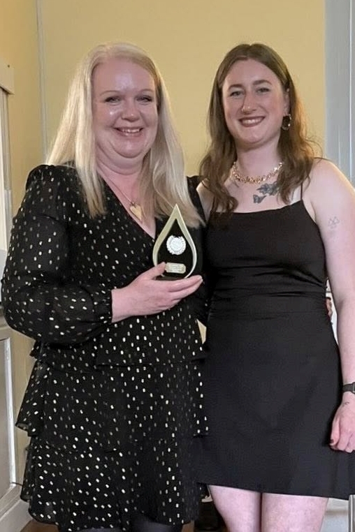 The coaches award was presented to Michelle Rusden by Drew Buckley