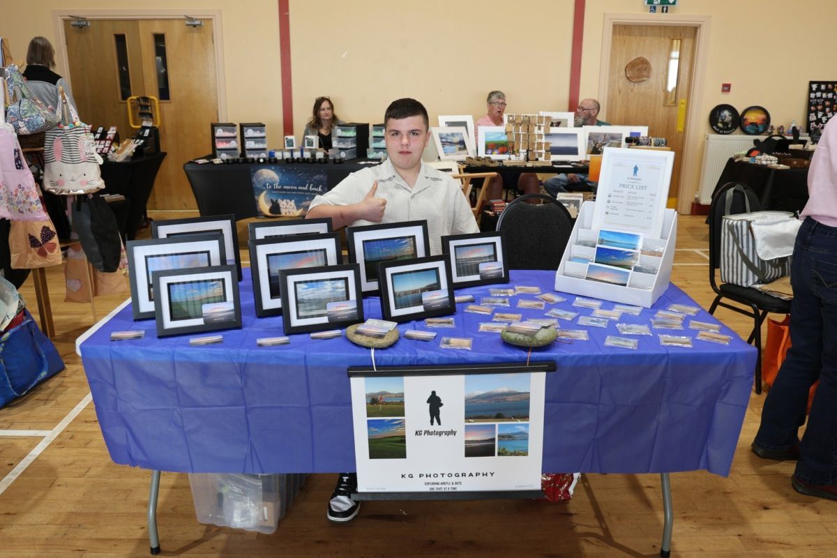 Kyle selling some of his photography products at a recent craft fair in Peninver Village Hall. Photograph: Kenny Craig.