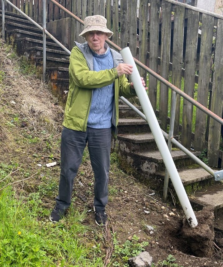 Upper Achintore Regeneration Group member Ken Johnston with one of the vandalised sign poles.