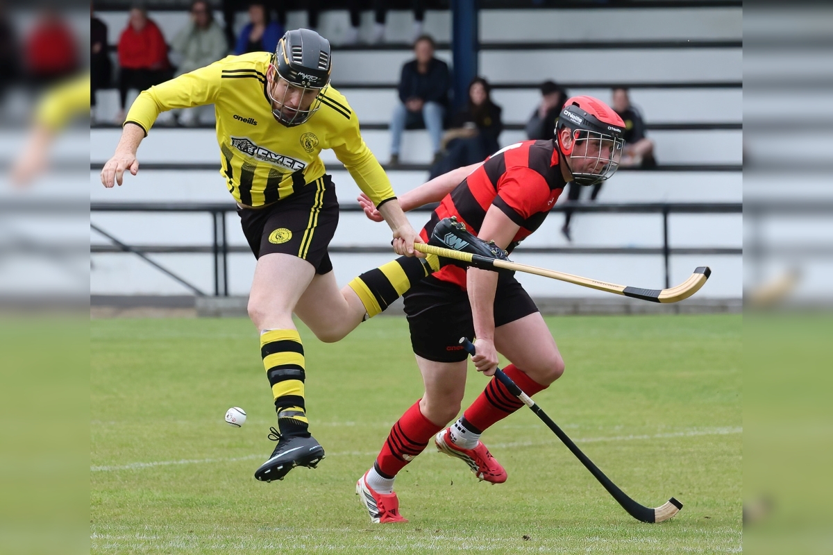 Oban Camanachd's Andy MacDonald blocks Coll MacKay of Inveraray. Photograph: Stephen Lawson