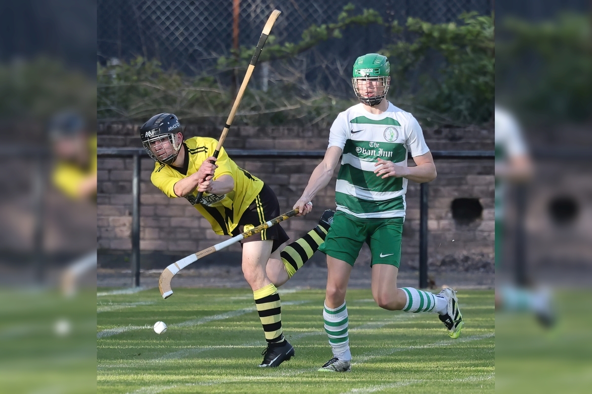 Inveraray's Campbell Watt clears the ball from Duncan MacEwan of Oban Celtic. Photograph: Stephen Lawson