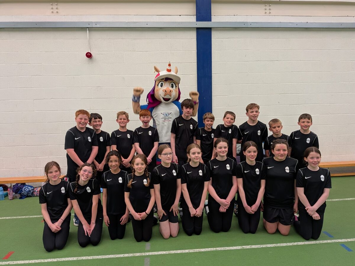 The proud Sports Hall Athletics team from Arran with Glasgow 2026 Commonwealth Games mascot Finnie. Photograph: Ross Dobson. The proud Sports Hall Athletics team from Arran with Glasgow 2026 Commonwealth Games mascot Finnie. Photograph: Ross Dobson.