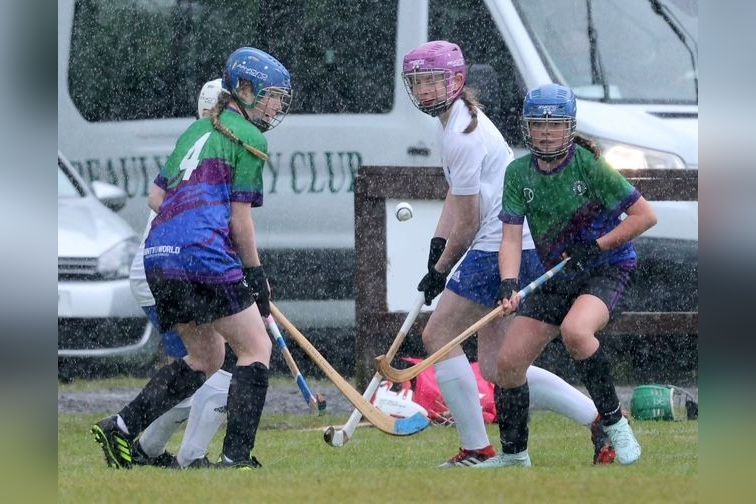 Forwards, Ruby MacArthur and Tia McKinnon, at work in the pouring rain. Photograph: Iain Cochrane Mac Rath. 