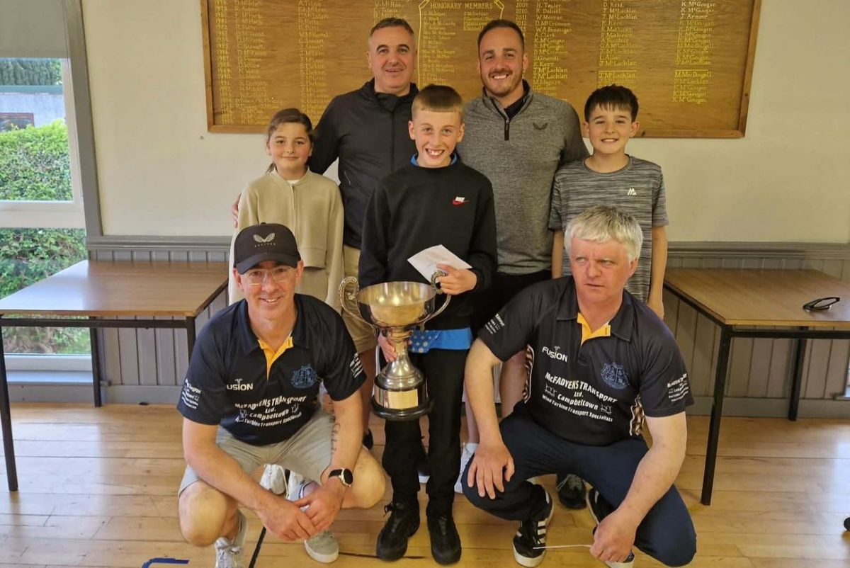 John McLachlan’s winning team with the Edith McFadyen Triples Trophy alongside representatives of sponsor McFadyens Transport.