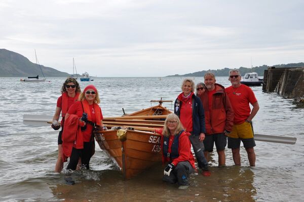 Oars out, community in