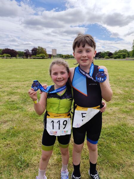 Brother and sister duo smash their first charity triathlon