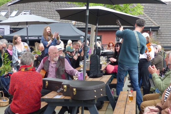 The terrace at the Douglas Hotel was packed with an appreciative crowd for every session. Photograph: George Machray.