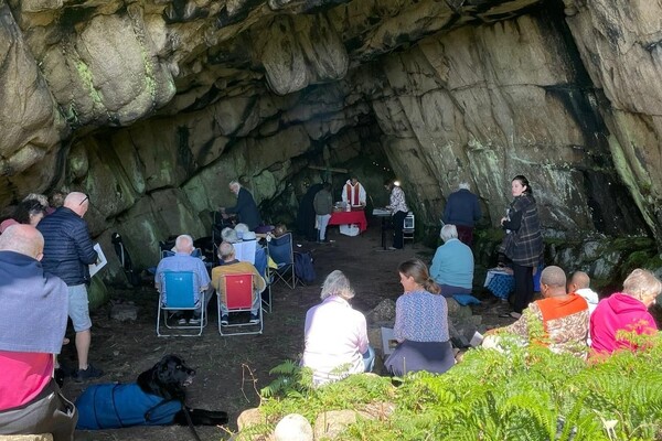 Worshippers at the Arran Churches Together service at Preacher&rsquo;s Cave. Photograph: Supplied. 