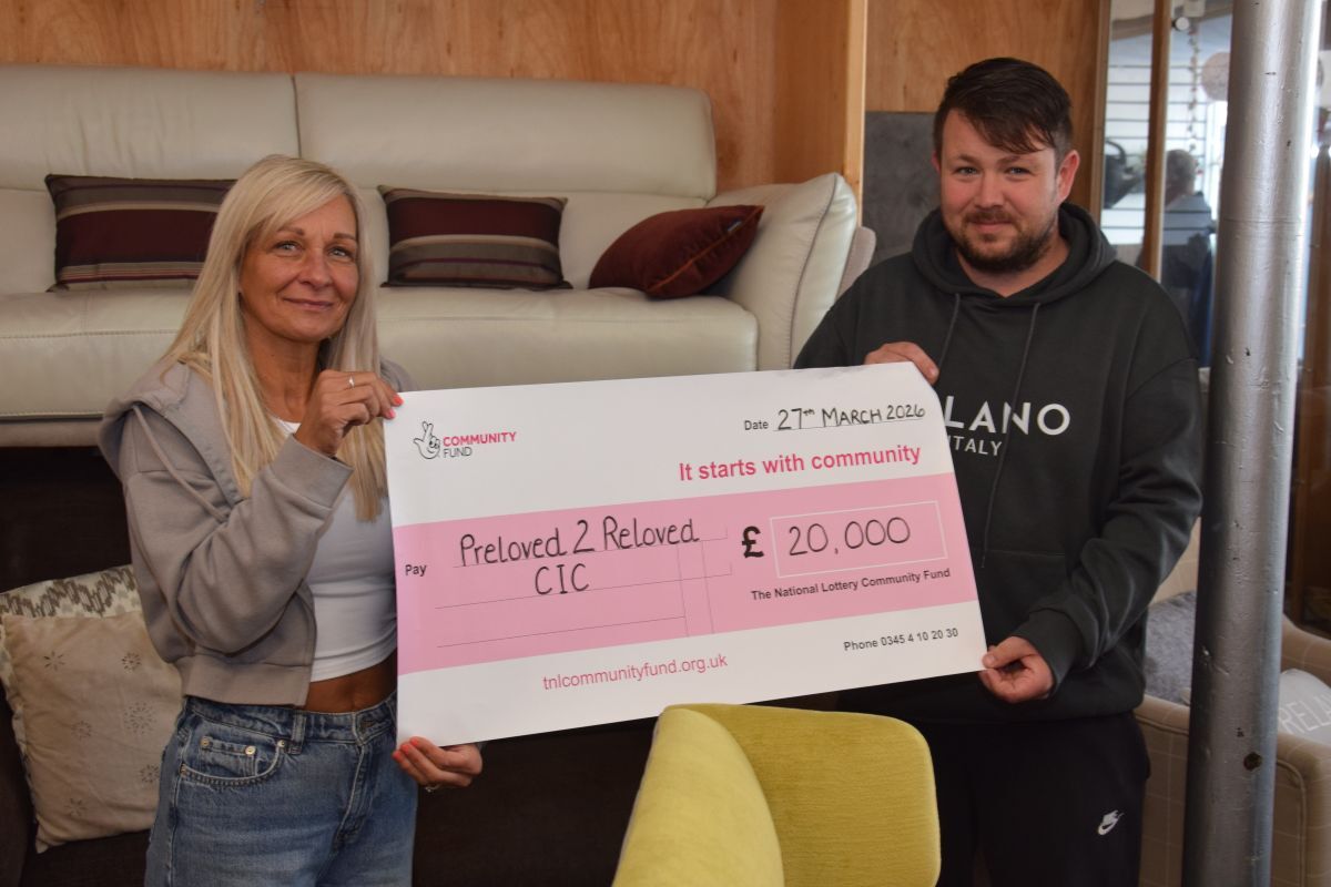 Preloved 2 Reloved manager Lorraine McCallum and shop assistant Neil Johnstone celebrating the &pound;20,000 funding award.