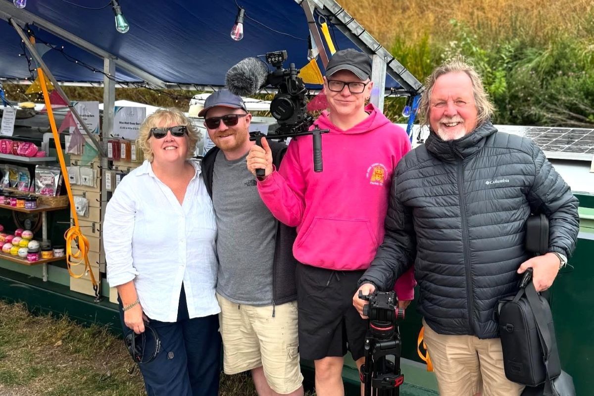 Campbeltown man Connor Chinn, second left, with members of the Channel 4 production team during filming for the latest series of Narrow Escapes, which features his life aboard a narrowboat and floating candle-making business.