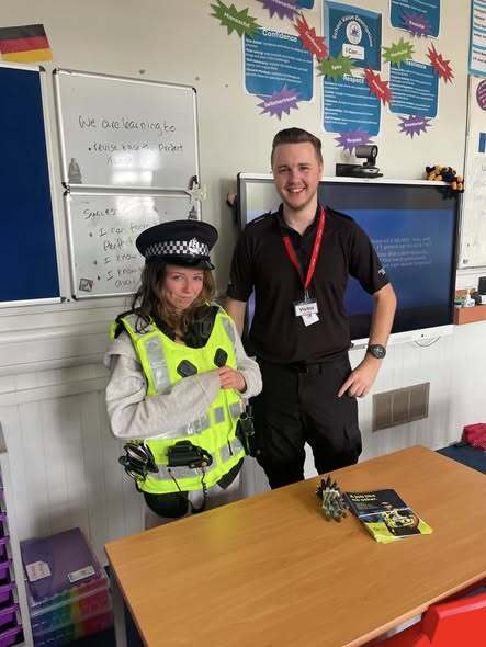no t25 tob high talks student tries on police gear