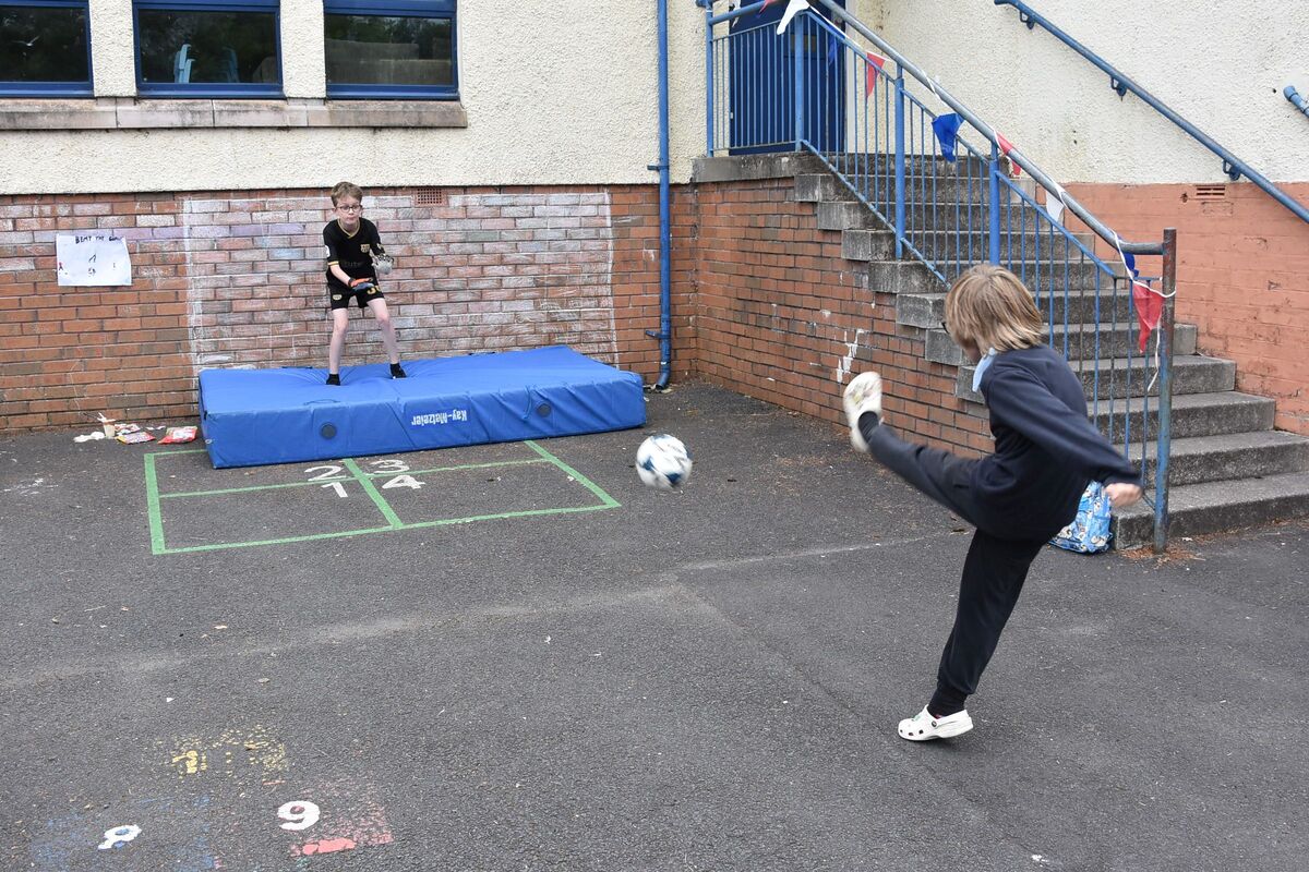 A popular game at the fete, the beat the goalie challenge. A popular game at the fete, the beat the goalie challenge.