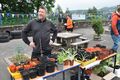 The plant stall, selling tomato and other flowering plants, was a popular attraction.