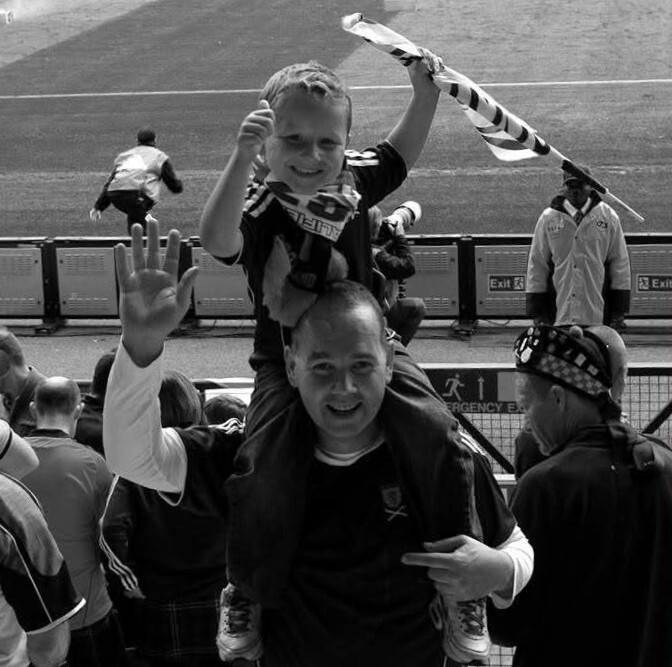 David and Lorne supporting Scotland together at Hampden in 2011, years before sharing the experience of Scotland’s return to the World Cup.