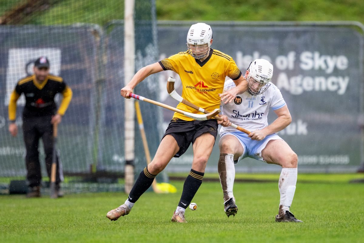 WEB NO F25 Shinty Skyes Ruaraidh MacLeod right during an encounter with Fort William in 2025 NP