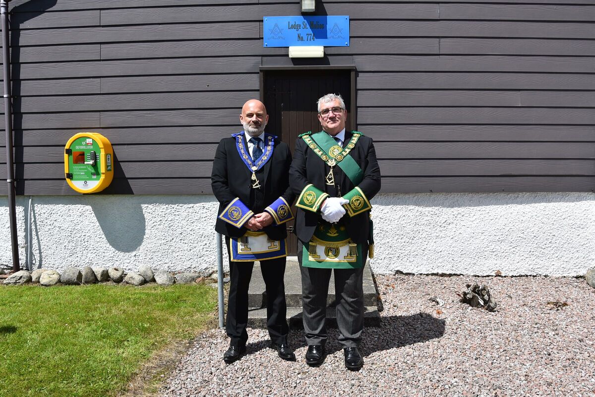 Master of St Molios Lodge, Derek Fleming, with Provincial Grand Master of Argyll and the Isles, John Stewart outside of St Molios Lodge in Lamlash. 