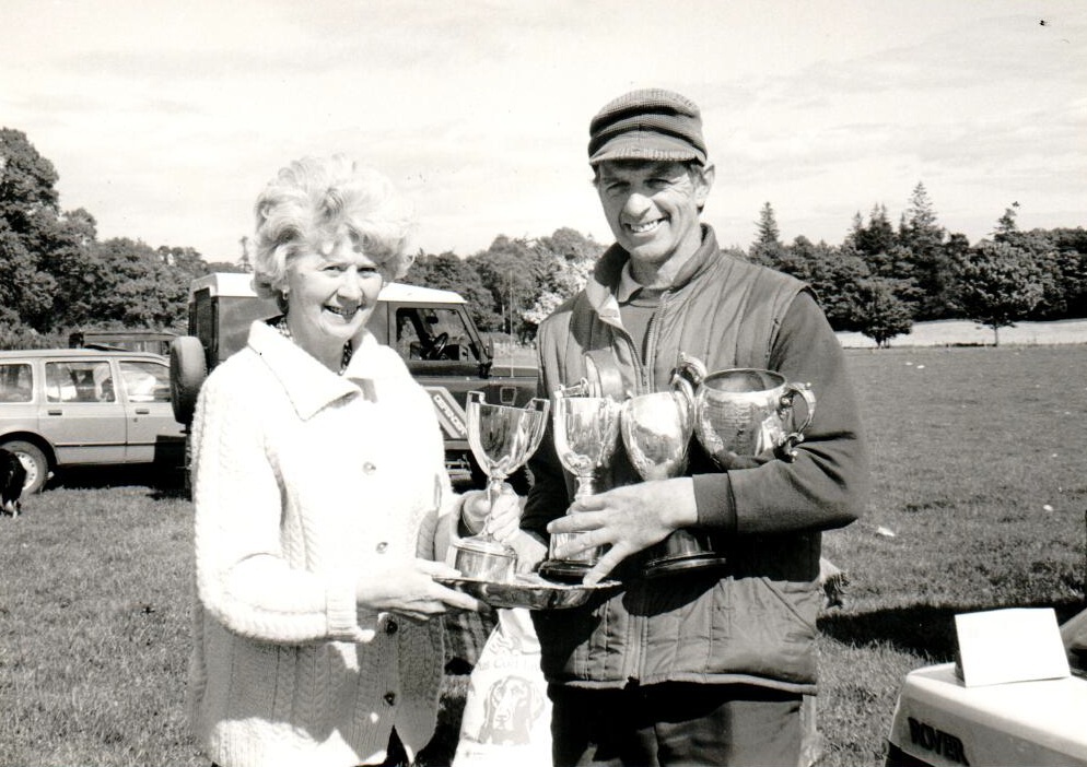 Over 70 entrants competed at Kildonan and District dog trials. Careen Miller presented Geoff Brookes with the cups he won with his dogs Nell and Kate. 