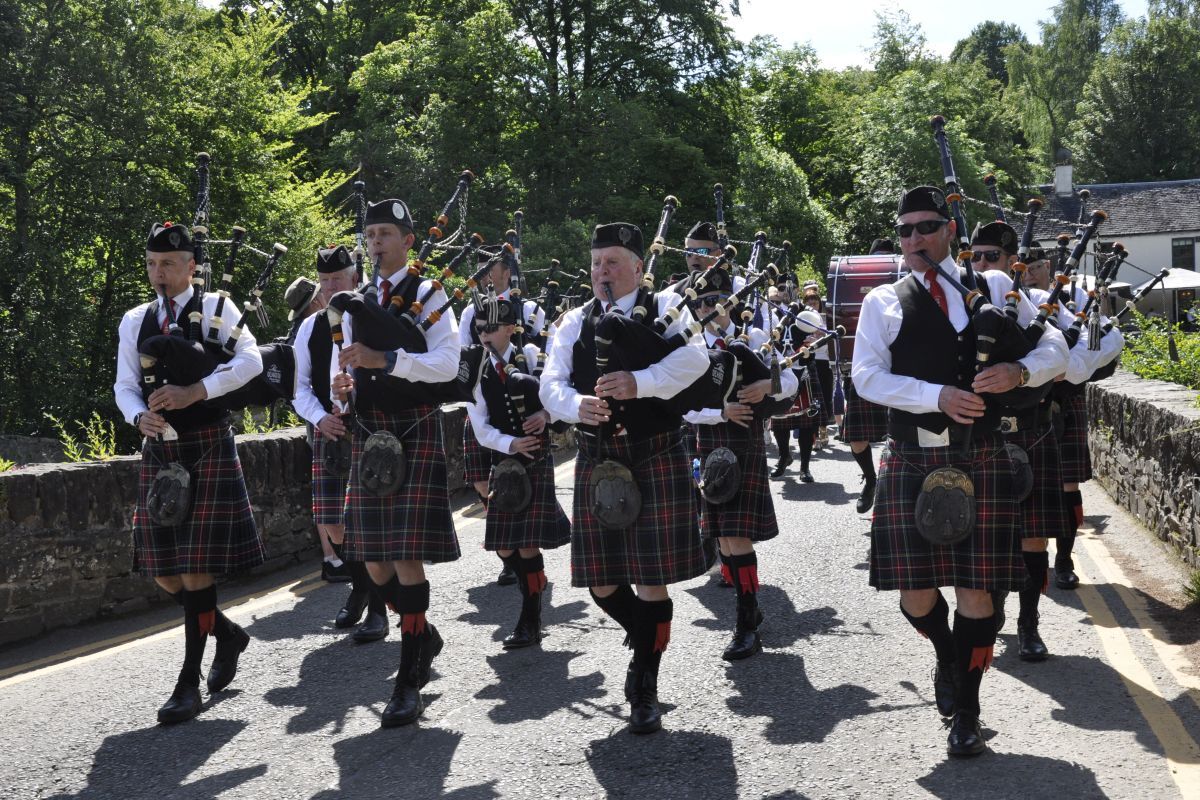 Doune Pipe Band crosing the Falls of Dochart.