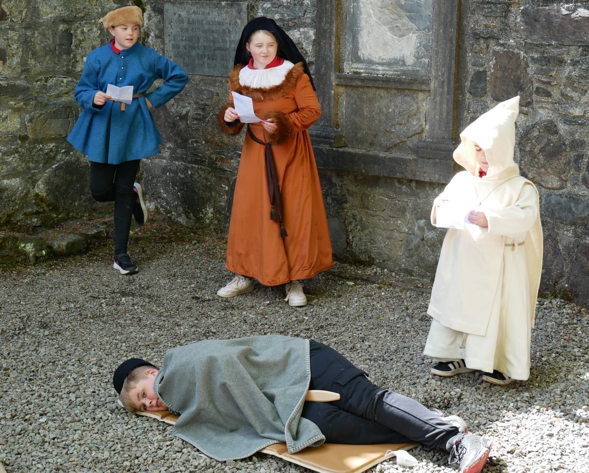 Foul play at Dunstaffnage Castle. Dunbeg pupils re-enact the historic murder. Photograph: Nicholas Burton