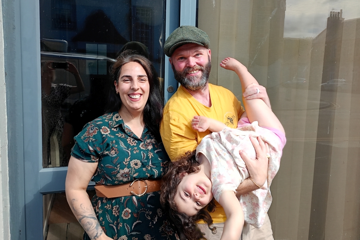 Michelle and Steven Forgrieve with daughter Erin (three) outside 24 Argyll Street in Lochgilphead, where the Hem House will be opening in early August. Photograph: Rita Campbell