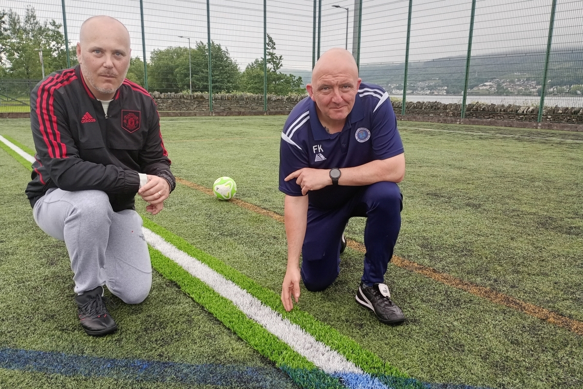 Lochgilphead Red Star 2013s coach Mark Charlton and Fraser Knox, Red Star chairman and coach of Red Star youth at the damaged Lochgilphead Astro pitch. Photograph: Rita Campbell