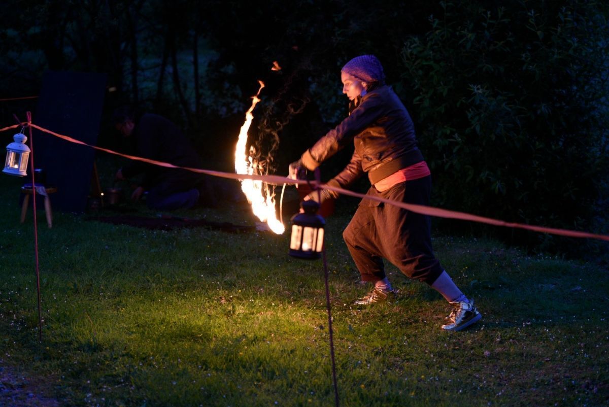 Lori Silvan entertained festival-goers with a mesmerising fire performance after dark. Photograph: Kyle King. Lori Silvan entertained festival-goers with a mesmerising fire performance after dark. Photograph: Kyle King.