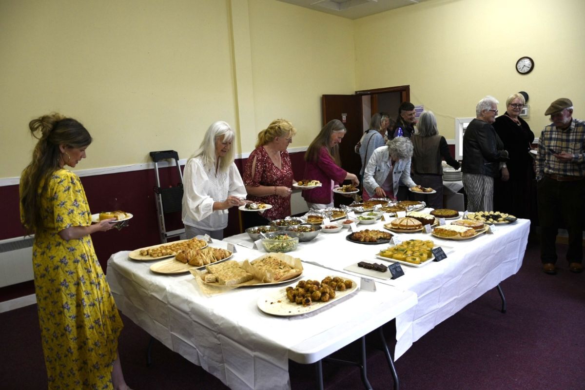 The summer solstice buffet proved a popular finale to a day of workshops, wellbeing sessions and outdoor activities. Photograph: Kyle King.
