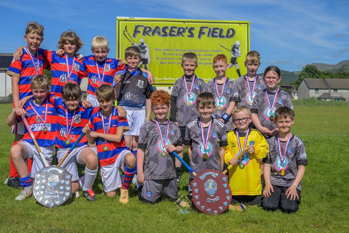 WEB NO F26 Fraser MacPhee Shinty Tournament 26 winners Kingussie and Bun sgoil Ghidhlig Loch Abar PH WEB NO F26 Fraser MacPhee Shinty Tournament 26 winners Kingussie and Bun sgoil Ghidhlig Loch Abar PH