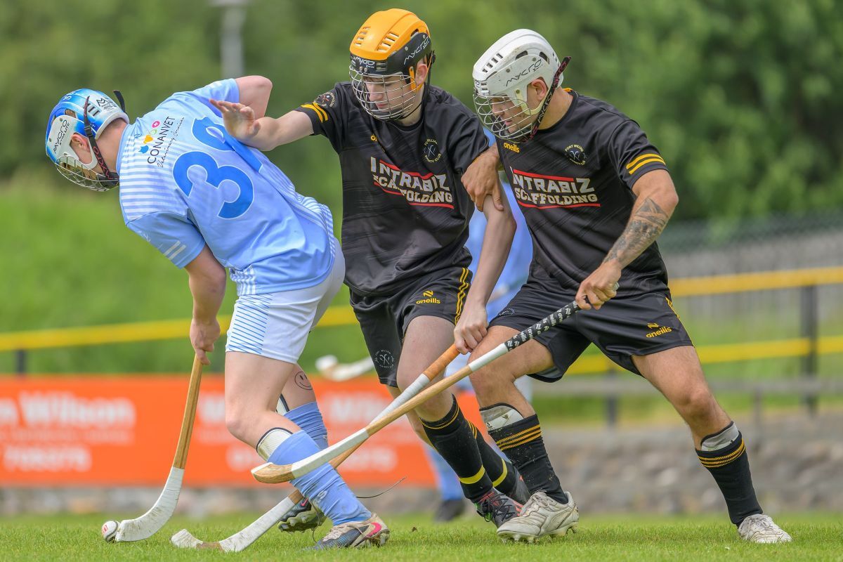 WEB NO F26 Shinty 26 Fort William Angus Mackinnon and Dan Nixon v Caberfeidh PH