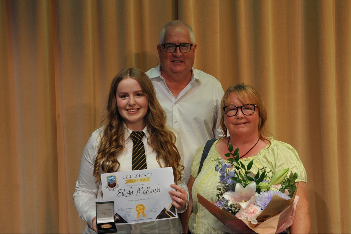 Arran High School Dux, Eilidh McNeish, with her parents Tom and Lynne McNeish at the school’s annual awards ceremony last week.
