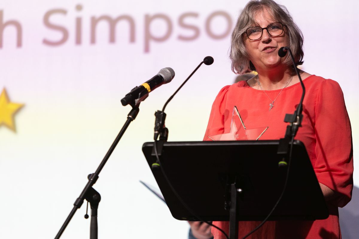Susan Simpson accepts the award for her son Noah who won Young Volunteer of the year. Susan is also co-founder of Anam Cara Fasgadh making the finals of the Volunteer Organisation of the Year category. Photograph: Lauren Martin