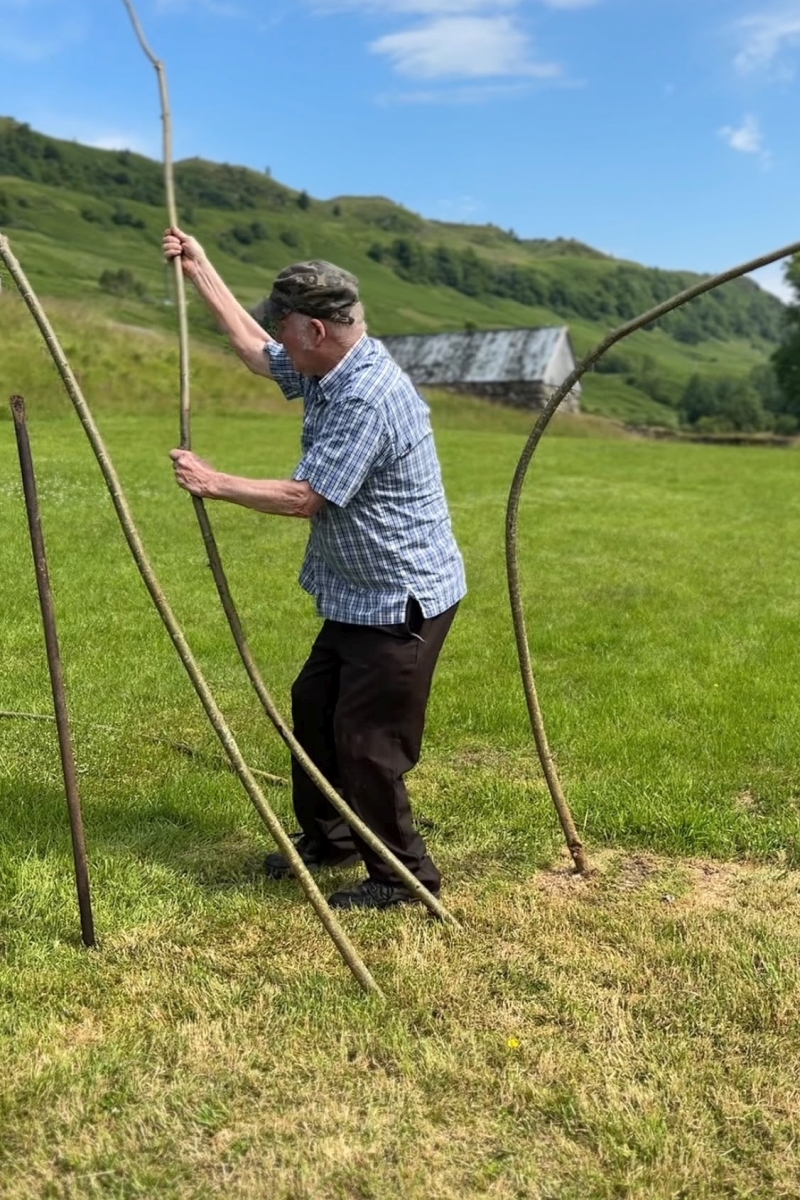 Scottish traveller Jimmy Williamson builds a bowtent. Photograph: Auchindrain