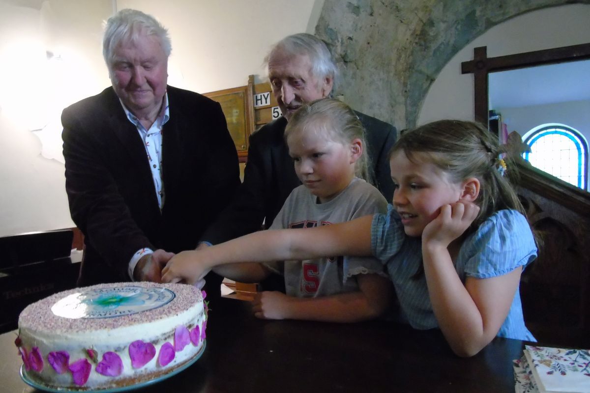 Cutting the cake at the St Moluag celebration on Lismore. Photograph: Rosemary Barry