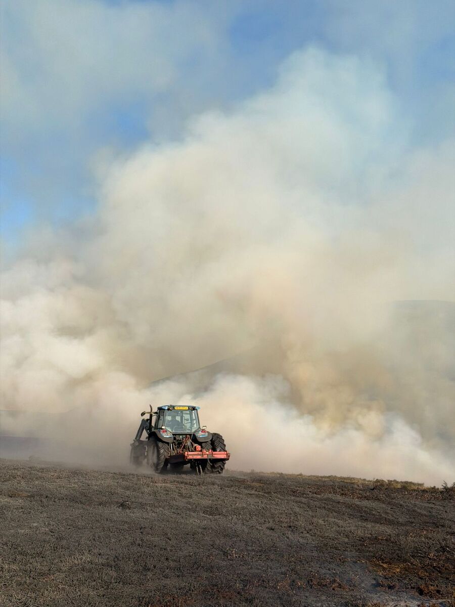 NO T27 Muirburn 01 A tractor and swipe used to create a firebreak web NO T27 Muirburn 01 A tractor and swipe used to create a firebreak web