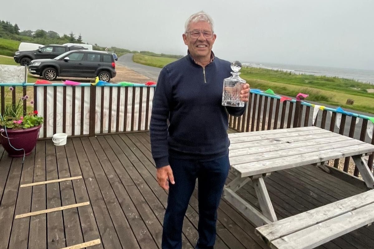 John Milesi was presented with the Dougie MacFarlane Award for Outstanding Contribution to Machrie Golf Club and Arran golf. Photograph: MBGC. 