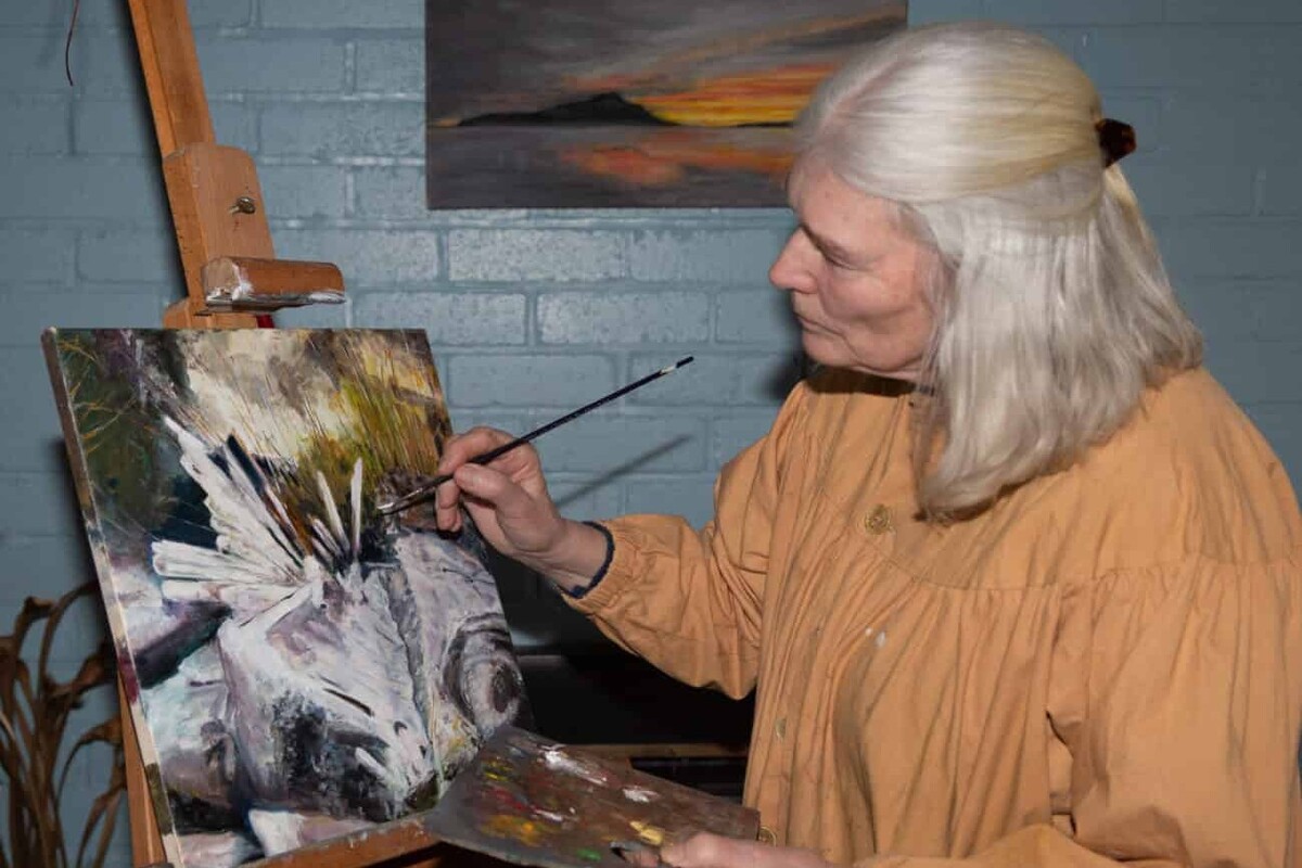 Arran Library’s featured artist for July, Lucy Cartledge, at work in her studio. Photograph: Supplied.