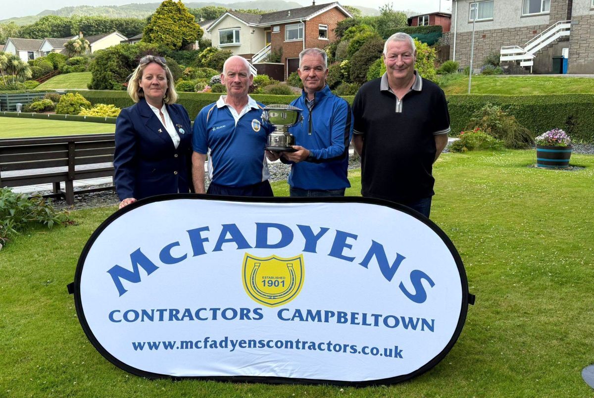 Open Pairs champions Jimmy Anderson and Gavin McLachlan, centre, with club president Lorraine Brodie, left, and Duncan Mauchline, right.