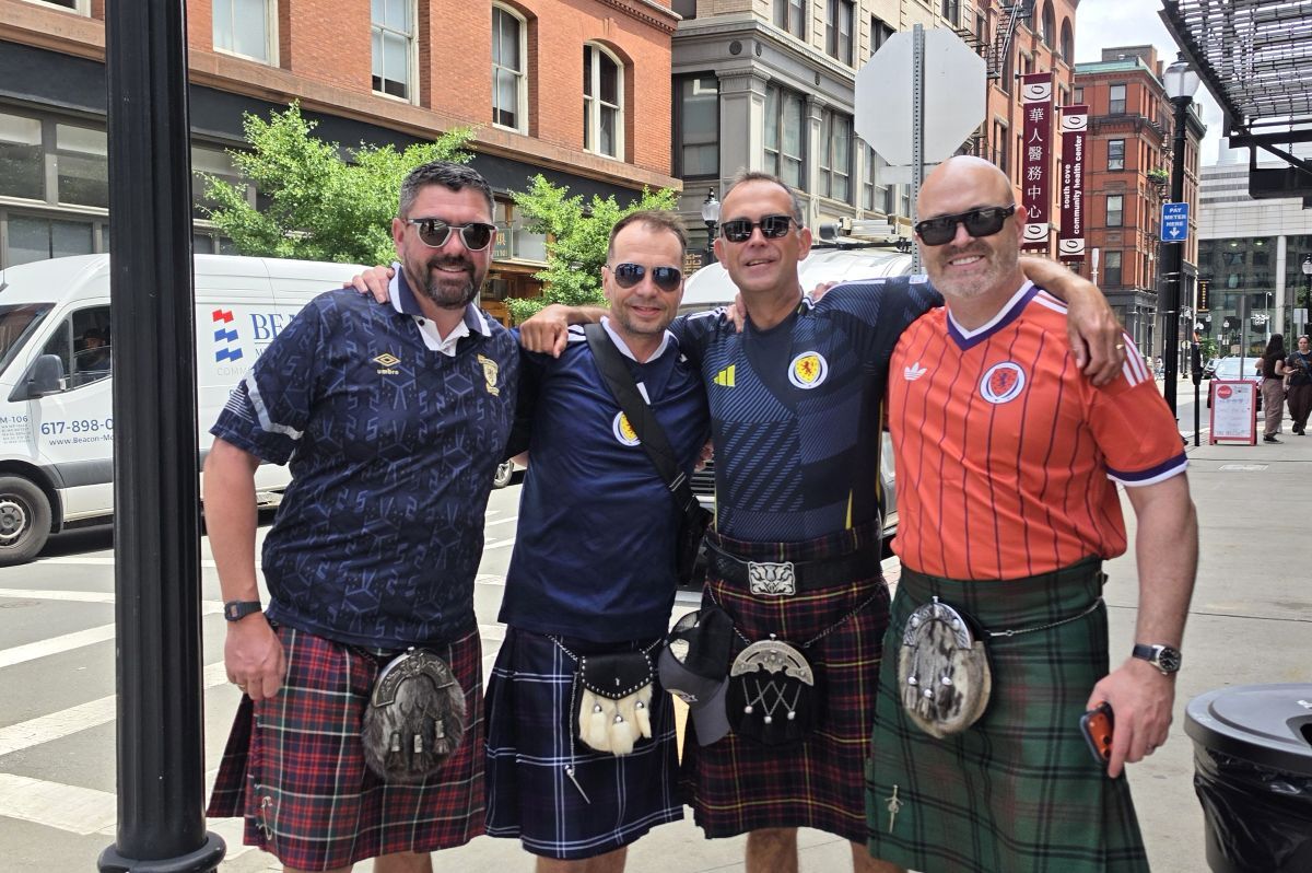 Ewen MacDonald, left, and Ian Aitken, second right, met up with friends Mark and Grant in Boston.