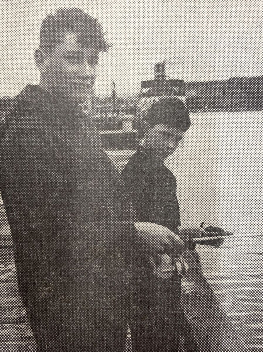 1966: Maxwell Robertson, left, with his life-saving rod. Behind him is George Pope, who helped pull Colin onto dry land.