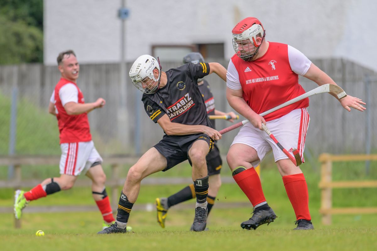 WEB NO F27 Shinty 26 Fort William Jack Kearney v Bute PH