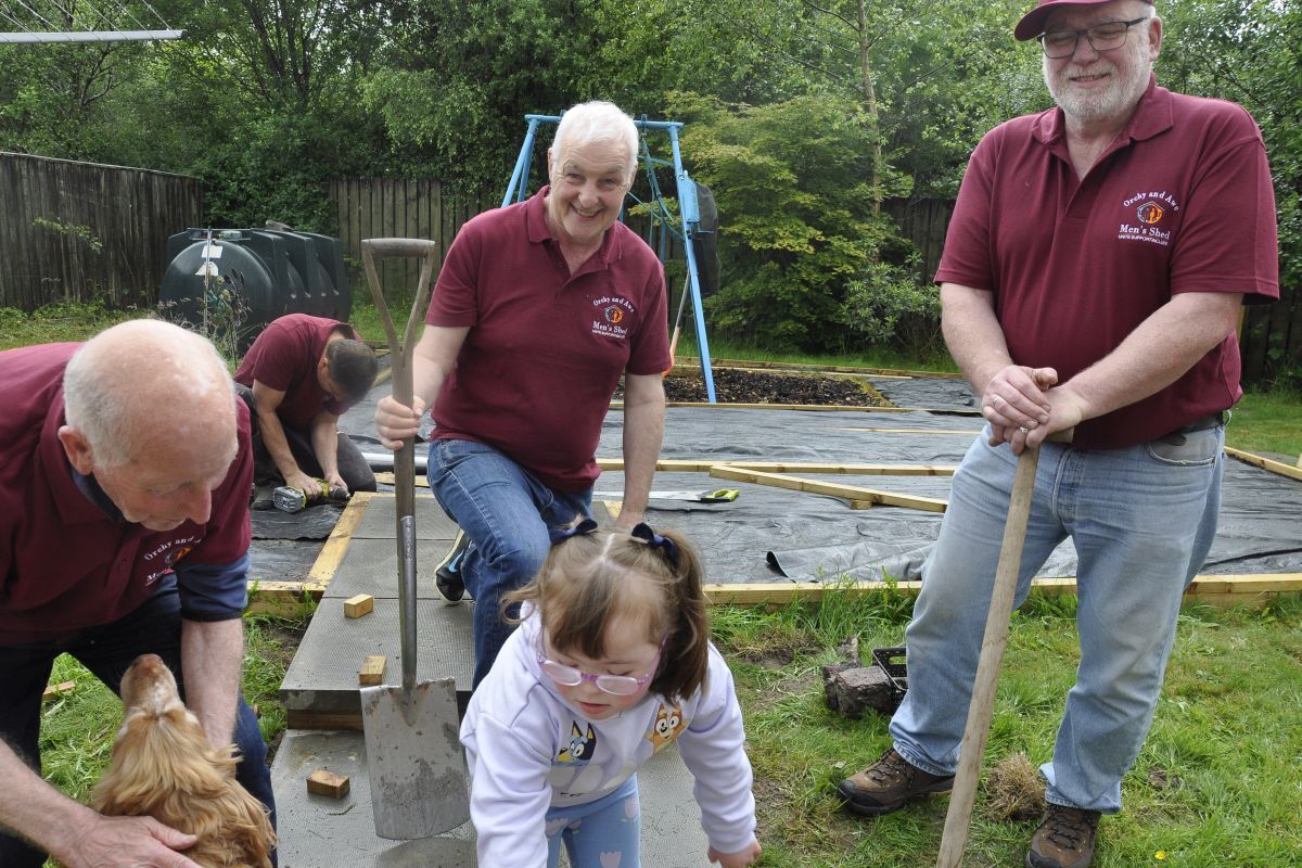 Orchy & Awe Men's Shed get a helping hand from Hope Sharp.