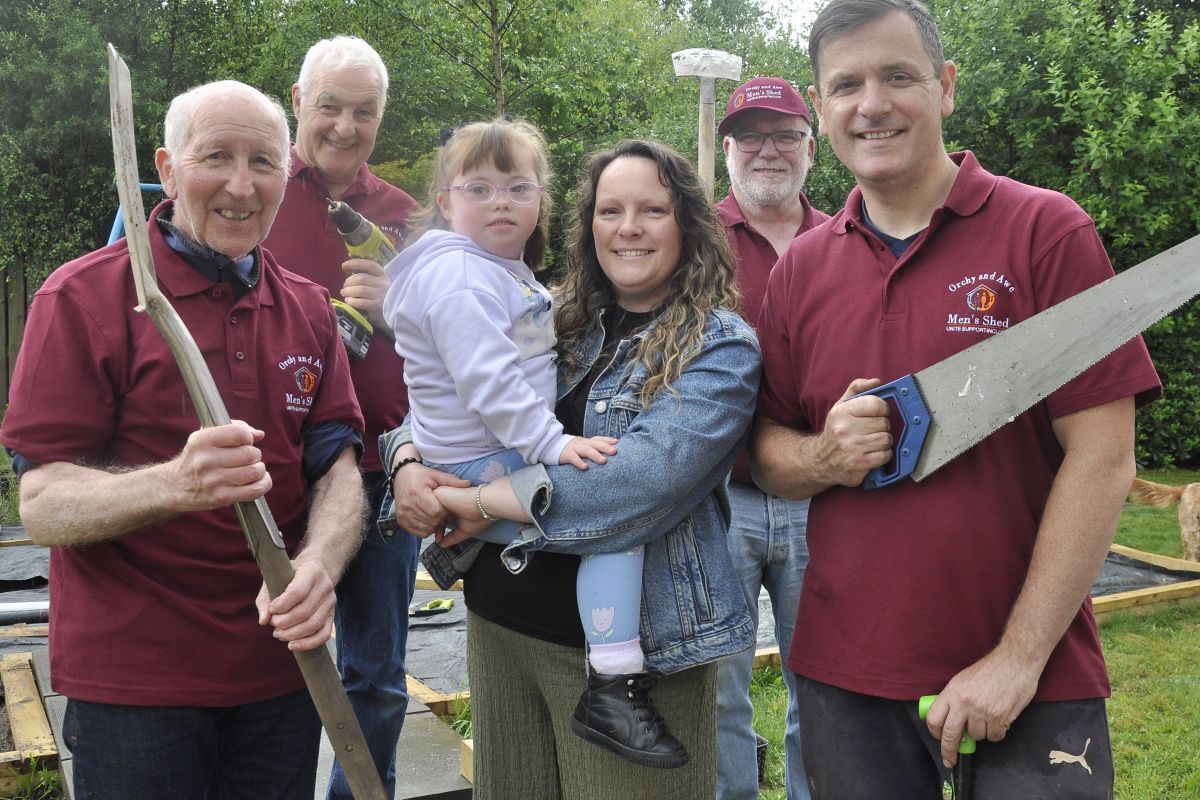 Centre of attention is Hope Sharp with mum Caroline and their friends from Orchy & Awe Men's Shed.