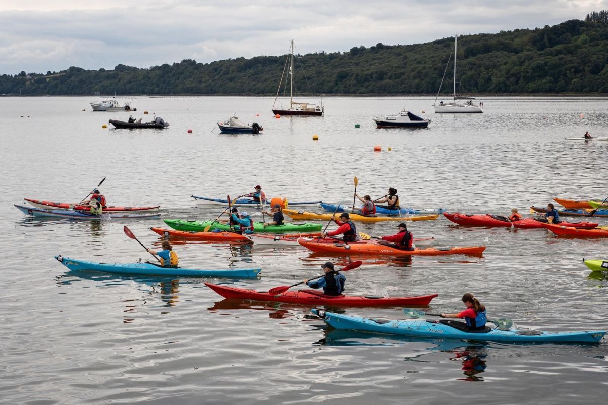 The touring kayak category sets off on a previous Holy Isle Challenge. Photograph: Otter’s Tail. The touring kayak category sets off on a previous Holy Isle Challenge. Photograph: Otter’s Tail.