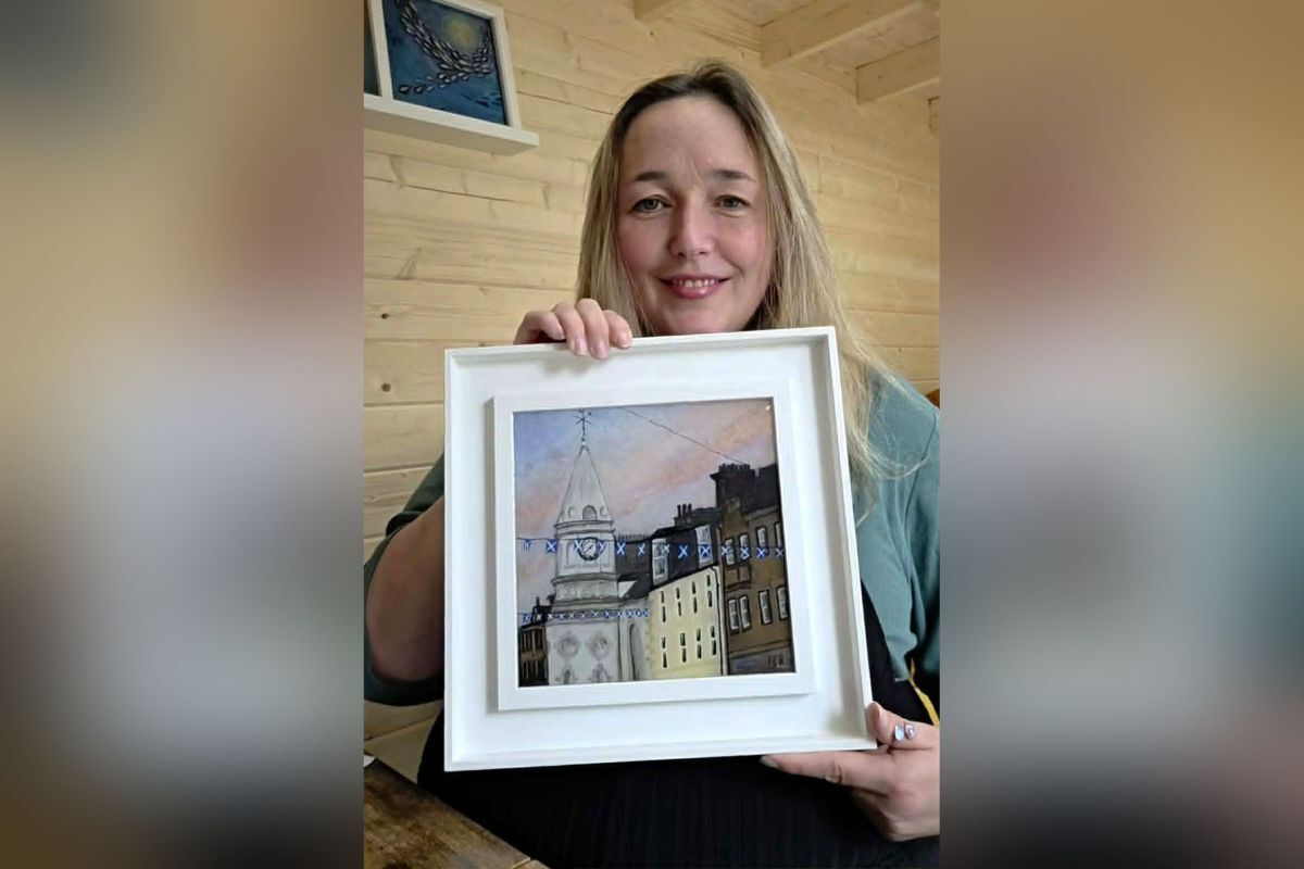 Town Hall Art Collective organiser Eilidh Anderson with her artwork of Campbeltown Town Hall, which will be raffled off during this weekend&rsquo;s exhibition.