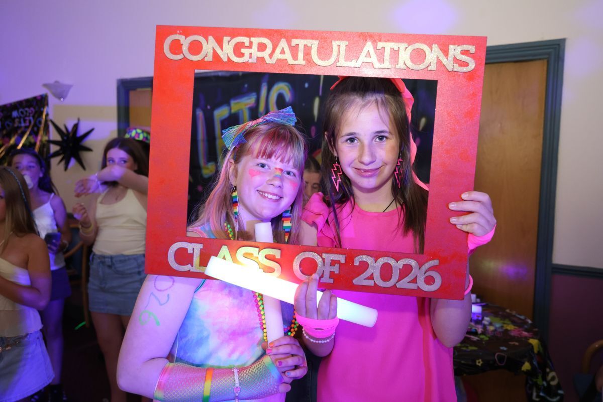 Two friends pose for a souvenir photograph. Photograph: Kenny Craig.